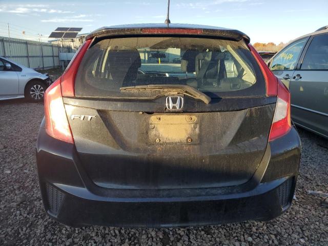 Photo 5 VIN: 3HGGK5H59FM775202 - HONDA FIT LX 