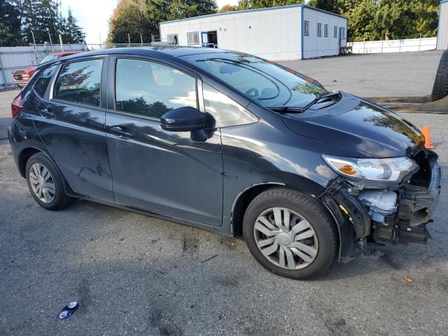 Photo 3 VIN: 3HGGK5H59HM708926 - HONDA FIT LX 