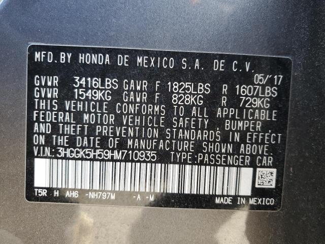 Photo 11 VIN: 3HGGK5H59HM710935 - HONDA FIT LX 