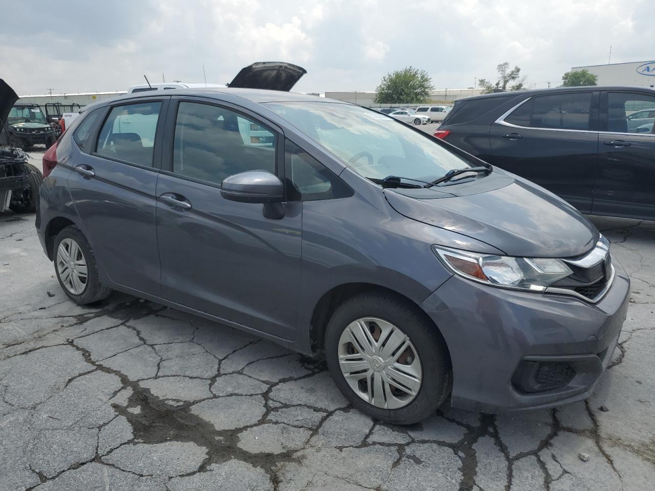 Photo 3 VIN: 3HGGK5H59JM705370 - HONDA FIT 