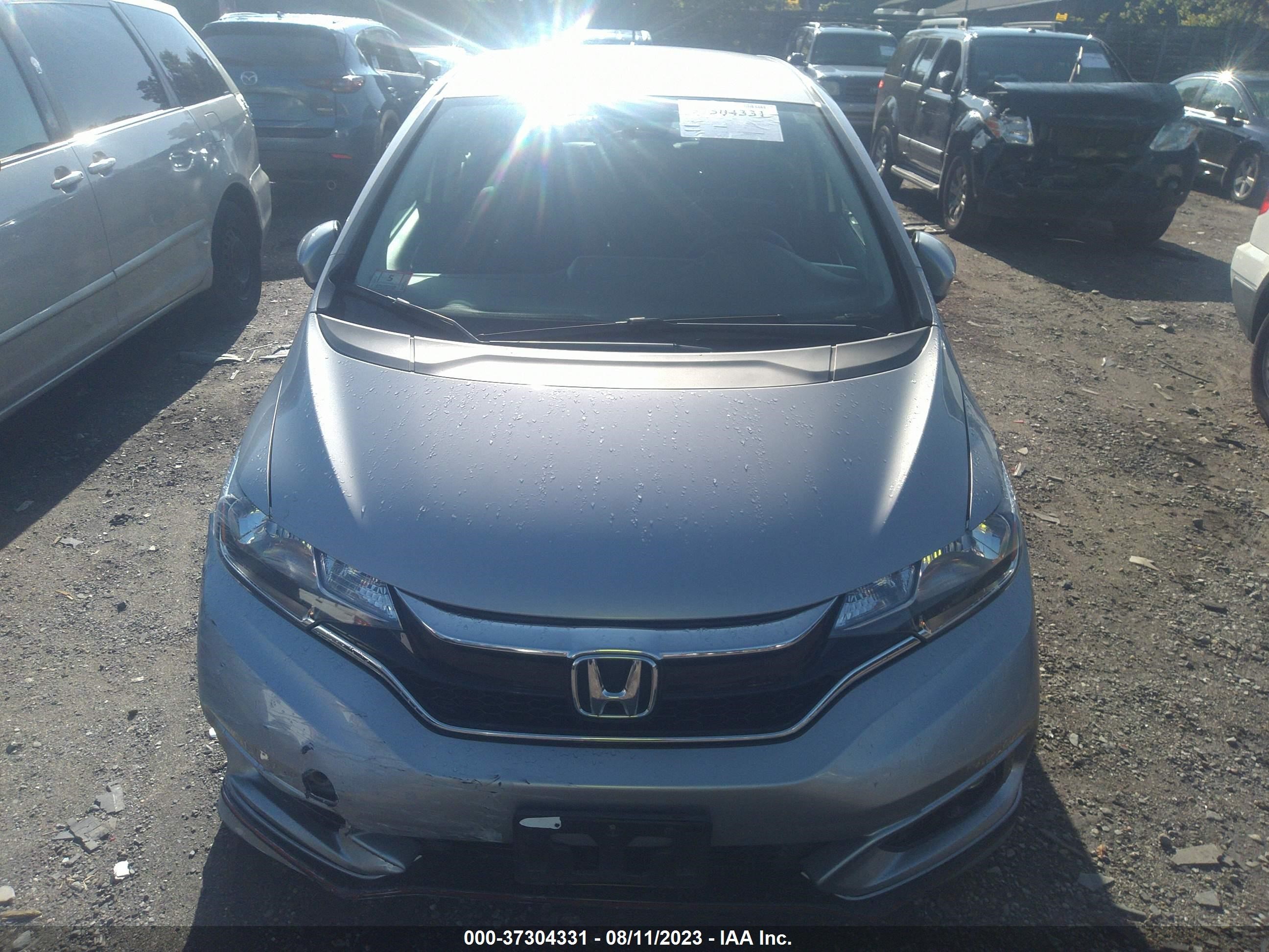 Photo 11 VIN: 3HGGK5H64JM736261 - HONDA FIT 