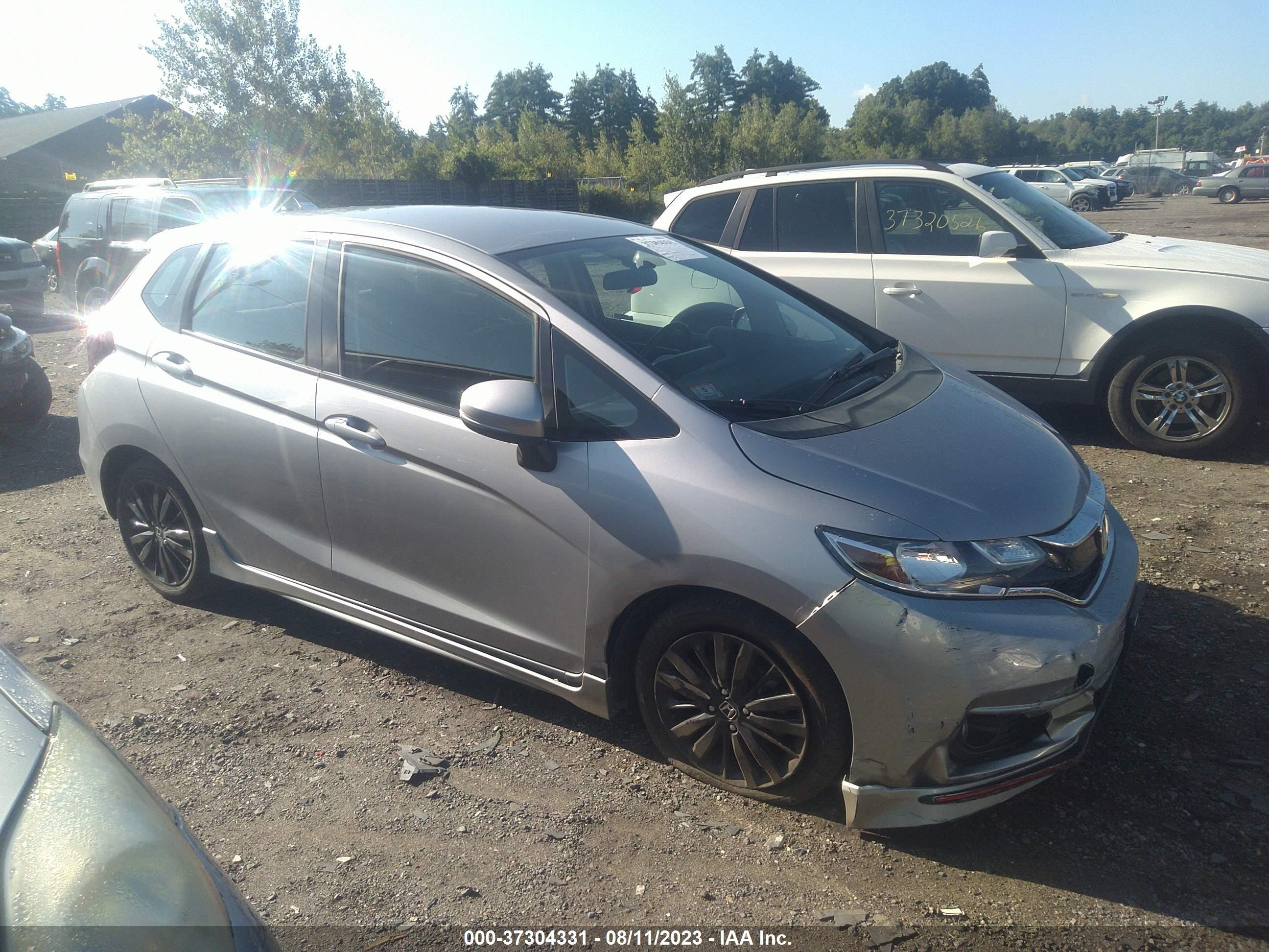 Photo 12 VIN: 3HGGK5H64JM736261 - HONDA FIT 