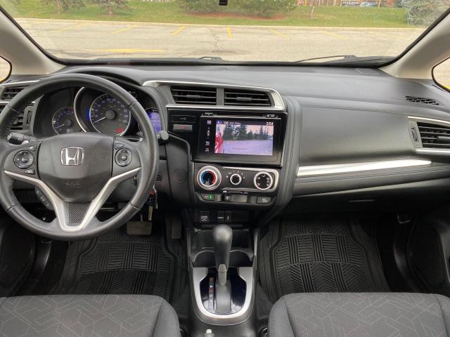 Photo 8 VIN: 3HGGK5H73GM102036 - HONDA FIT EX 