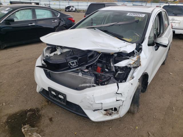 Photo 8 VIN: 3HGGK5H83GM705125 - HONDA FIT EX 