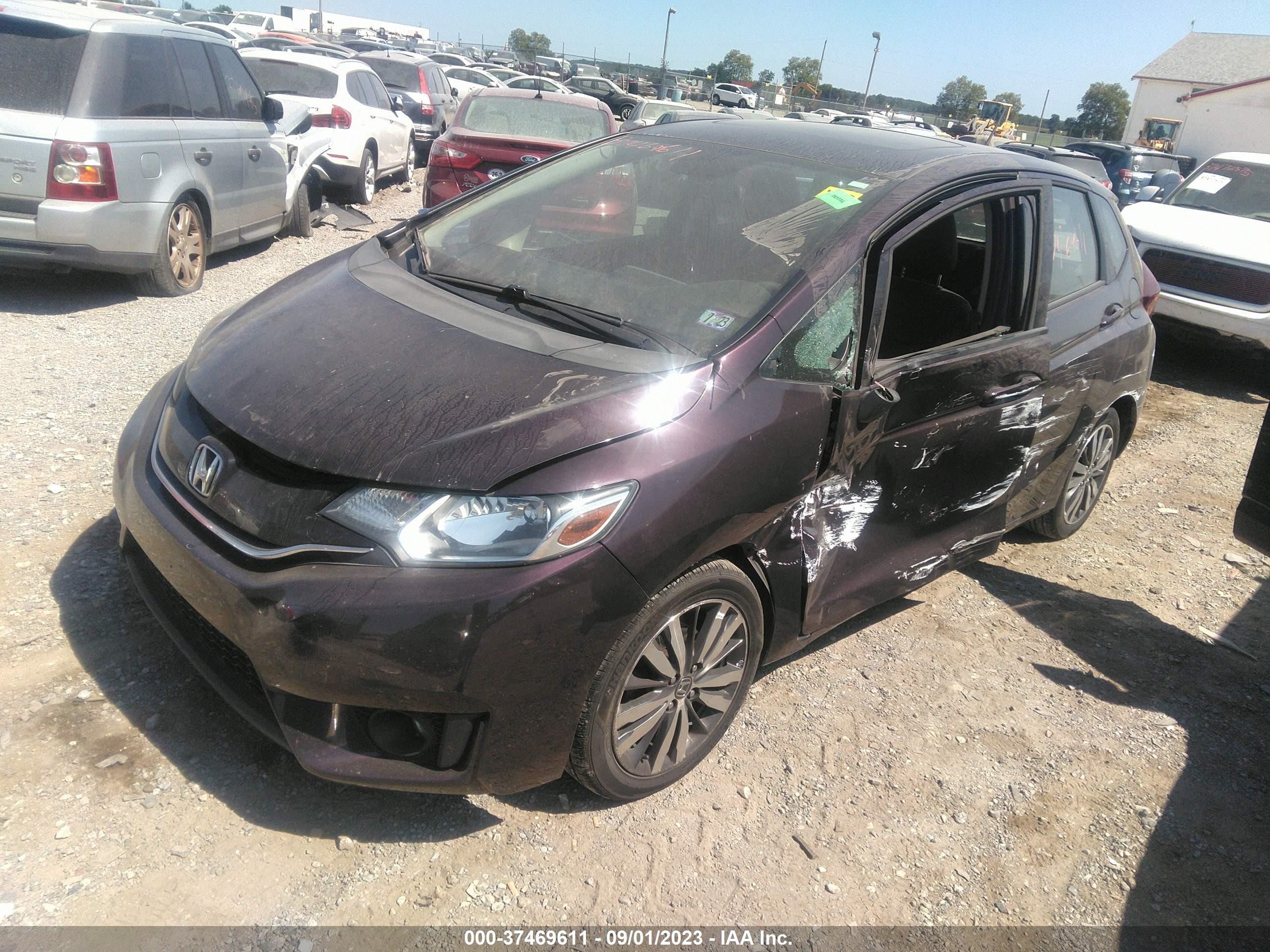 Photo 1 VIN: 3HGGK5H84GM704212 - HONDA FIT 