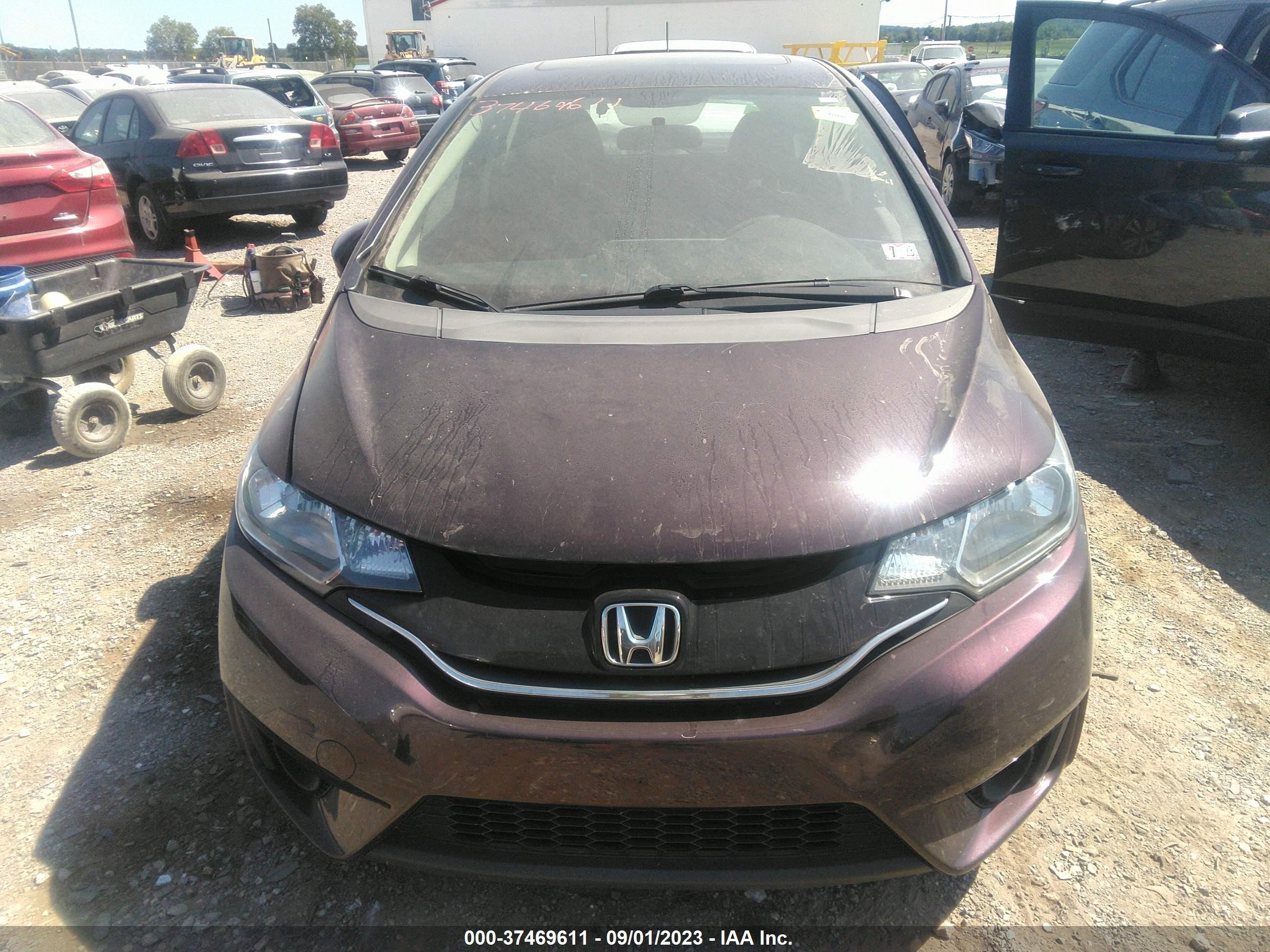 Photo 11 VIN: 3HGGK5H84GM704212 - HONDA FIT 