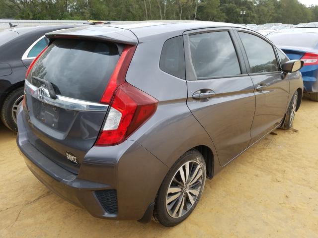 Photo 3 VIN: 3HGGK5H8XGM703582 - HONDA FIT EX 