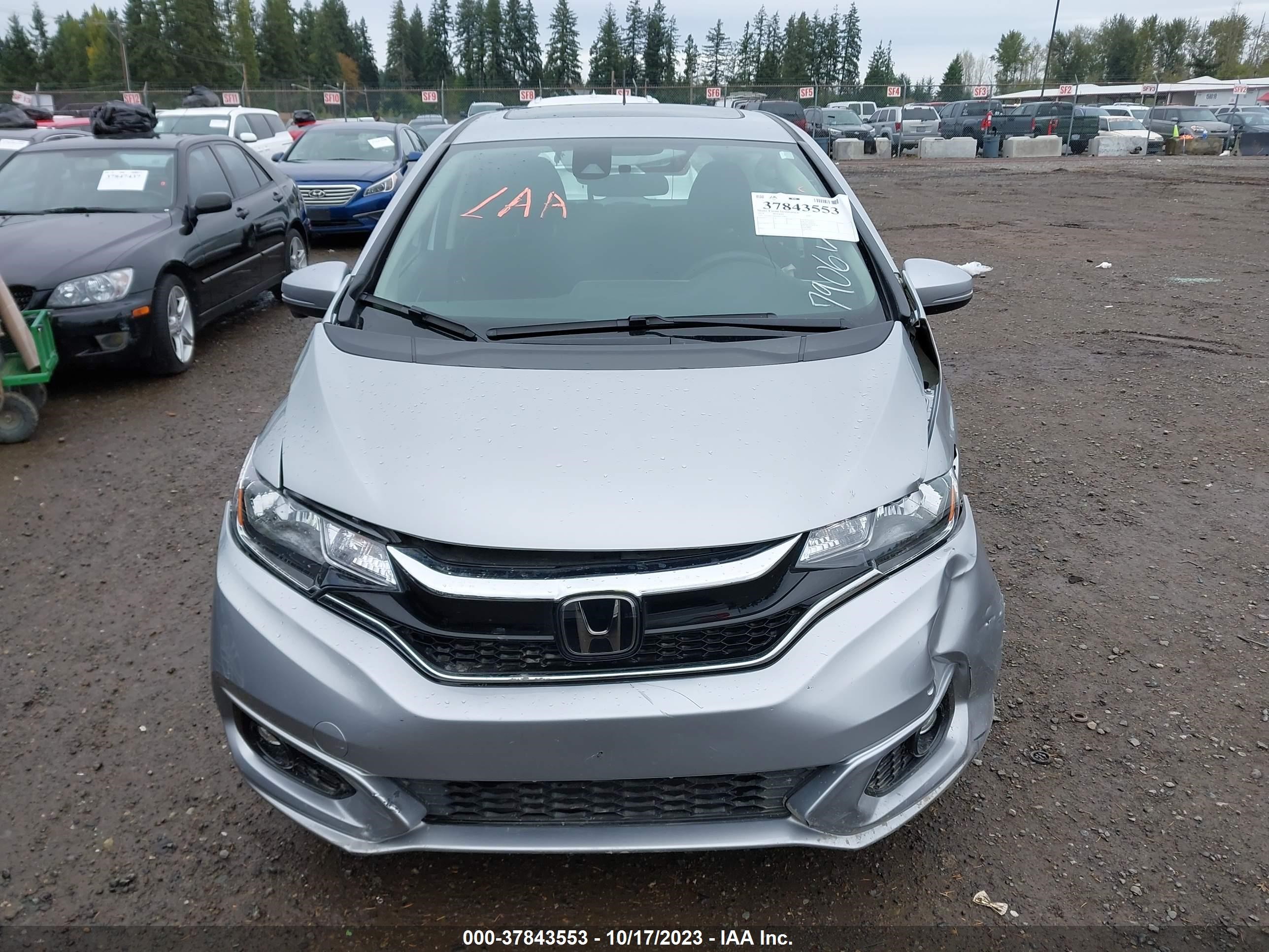 Photo 11 VIN: 3HGGK5H8XJM727906 - HONDA FIT 