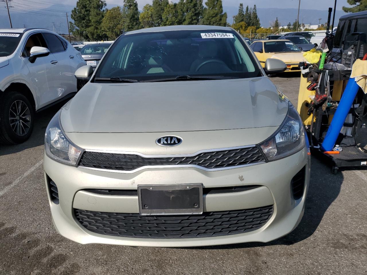 Photo 4 VIN: 3KPA24ABXJE079045 - KIA RIO 