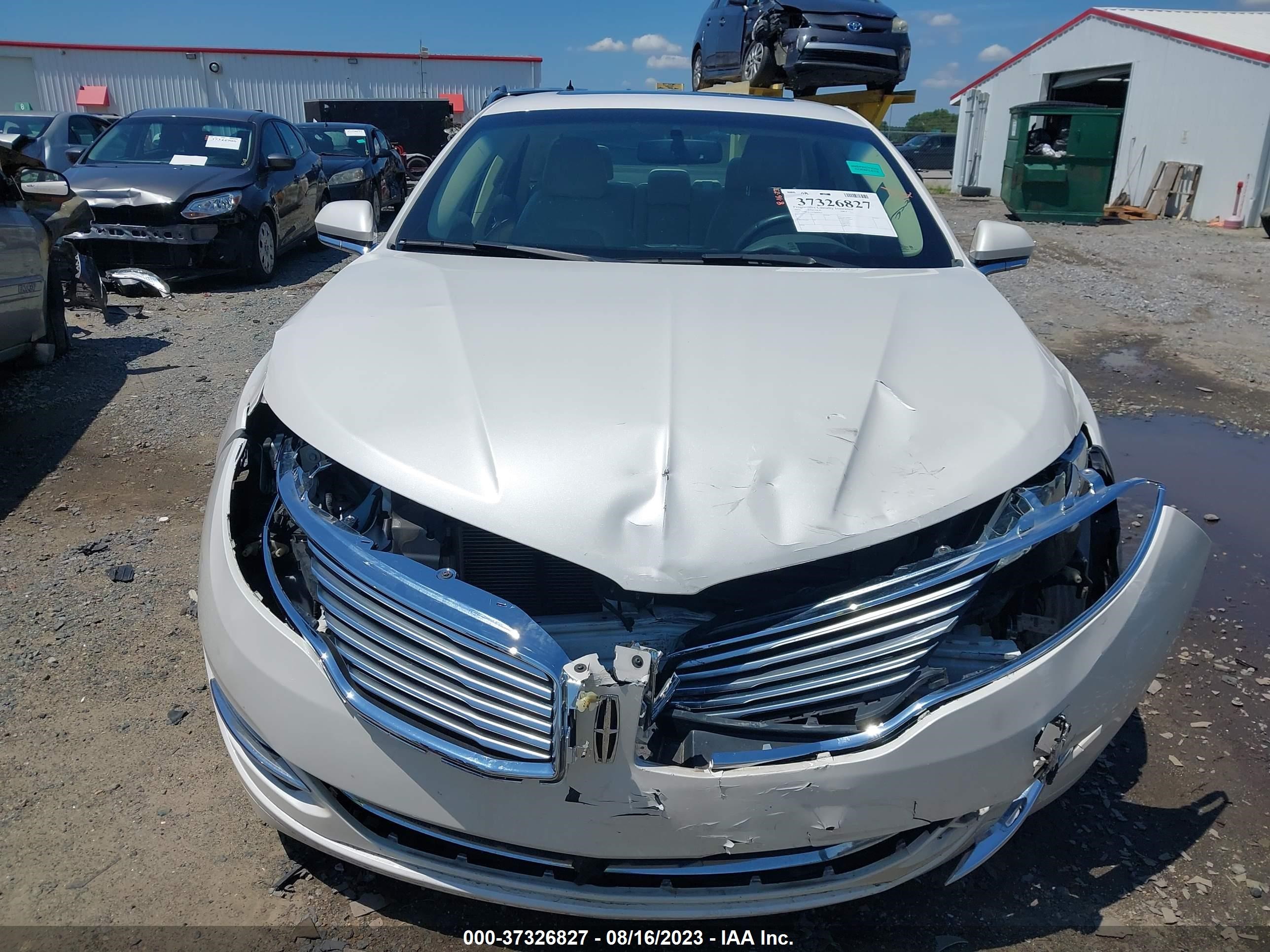 Photo 11 VIN: 3LN6L2LUXFR600914 - LINCOLN MKZ 