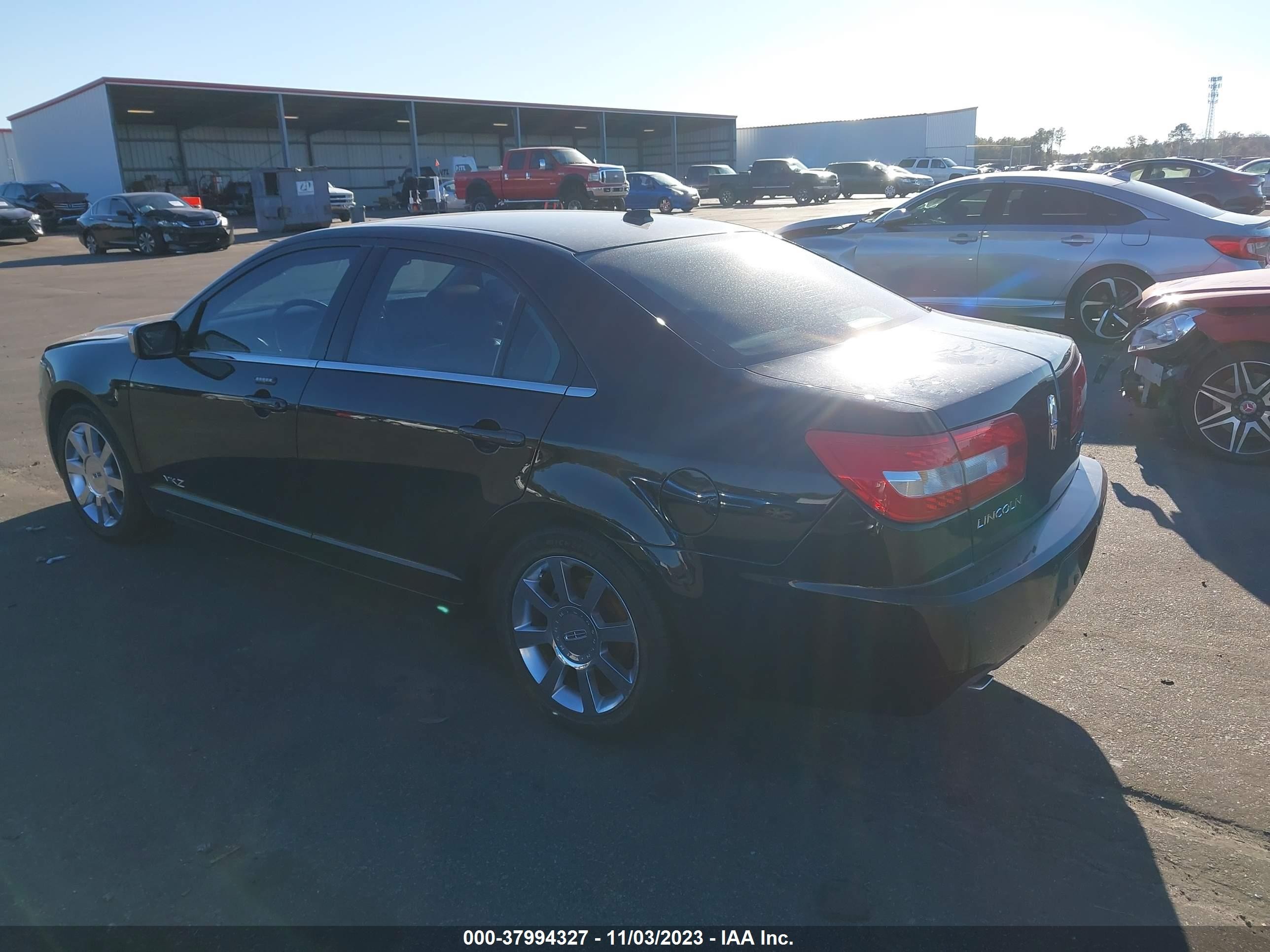 Photo 2 VIN: 3LNHM26TX8R637442 - LINCOLN MKZ 