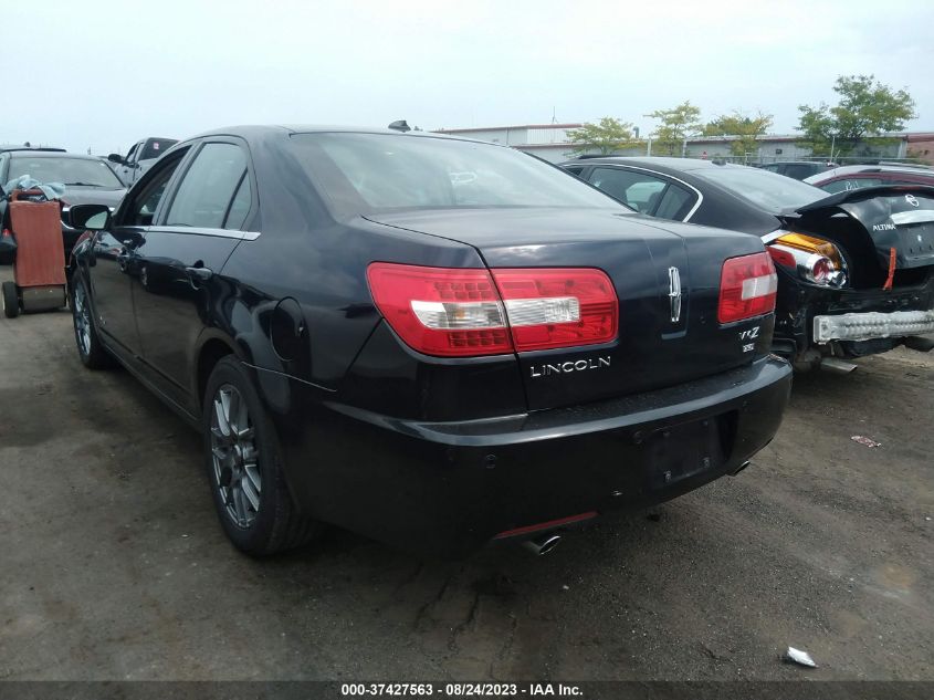 Photo 2 VIN: 3LNHM28TX9R606271 - LINCOLN MKZ 