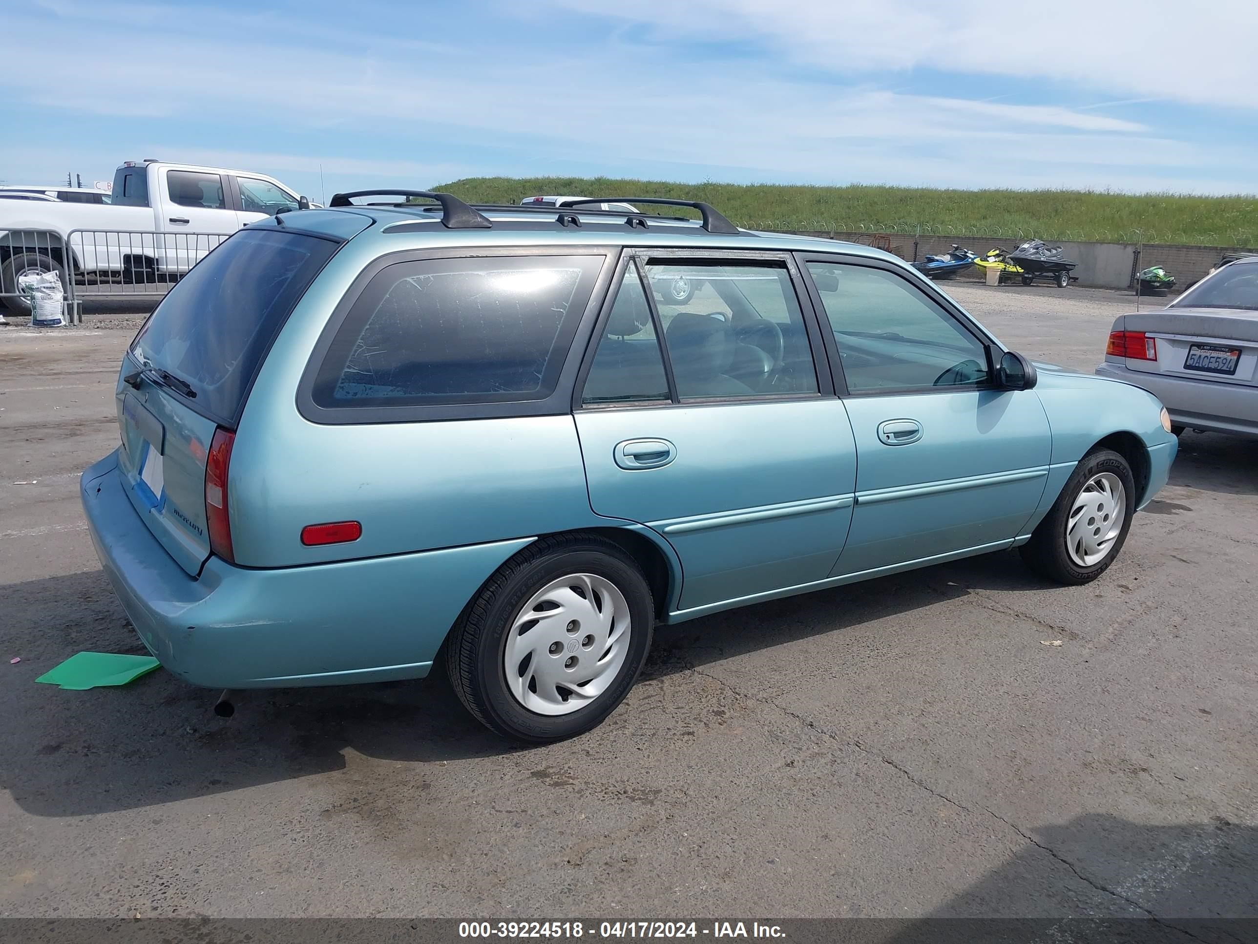 Photo 3 VIN: 3MELM15P9VR605668 - MERCURY TRACER 