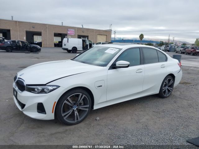 Photo 1 VIN: 3MW39FF06P8D06033 - BMW 330E 