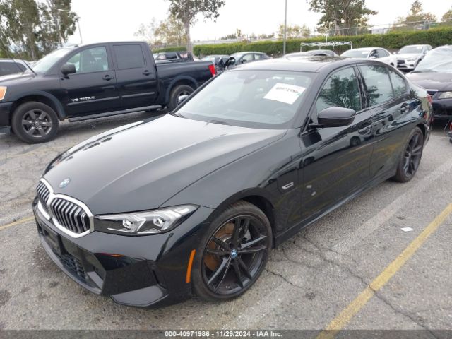 Photo 1 VIN: 3MW39FF0XP8D18556 - BMW 330E 