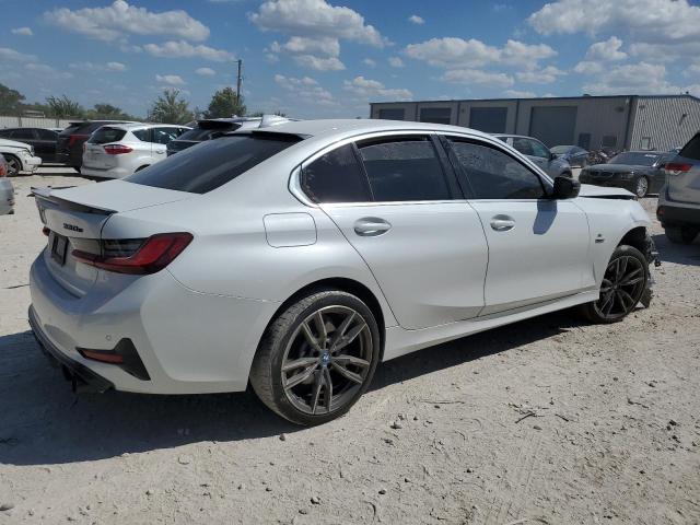 Photo 2 VIN: 3MW5P7J04N8C40218 - BMW 330E 