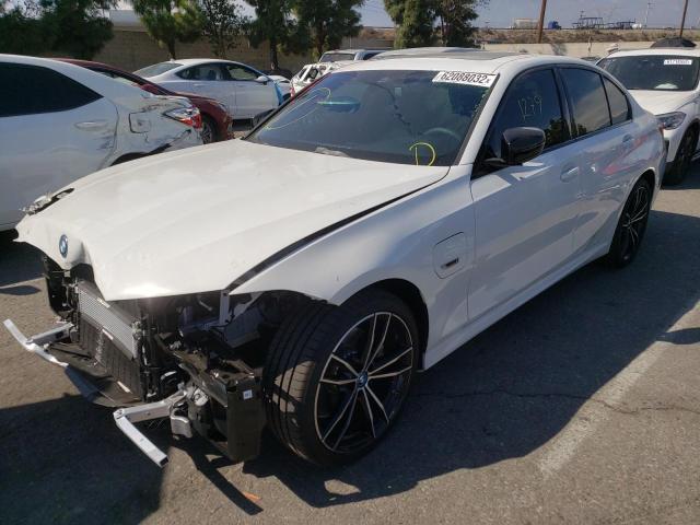 Photo 1 VIN: 3MW5P7J05N8C78072 - BMW 330E 