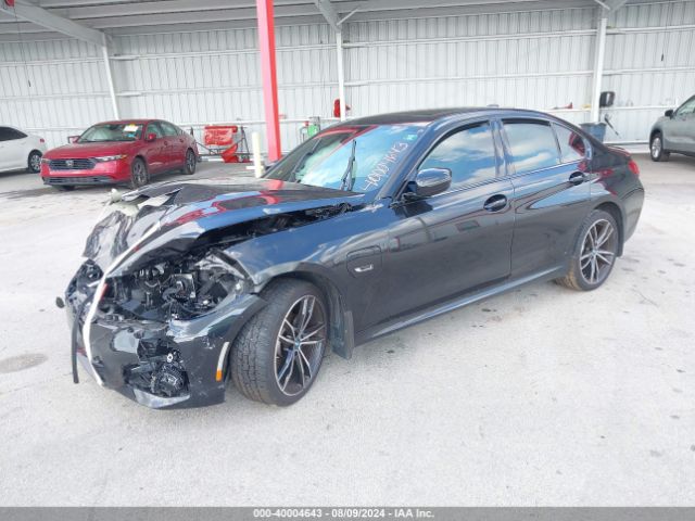 Photo 1 VIN: 3MW5P7J07N8C62360 - BMW 330E 