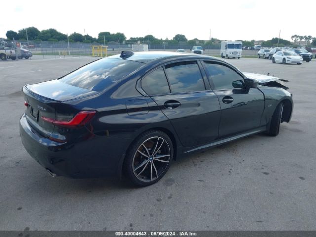 Photo 3 VIN: 3MW5P7J07N8C62360 - BMW 330E 