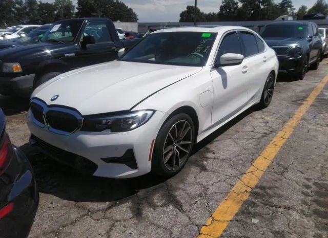 Photo 1 VIN: 3MW5P7J09M8B91743 - BMW 330E 