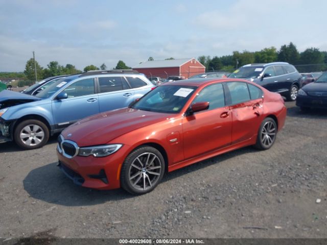 Photo 1 VIN: 3MW5P9J07N8C56862 - BMW 330E 