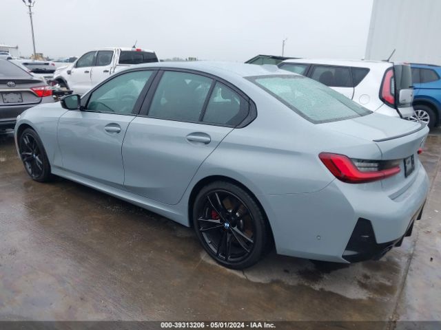 Photo 2 VIN: 3MW69FF03P8D52707 - BMW 330I 