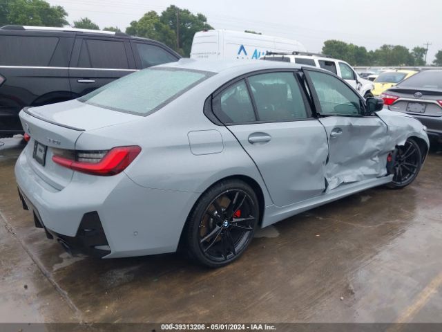 Photo 3 VIN: 3MW69FF03P8D52707 - BMW 330I 