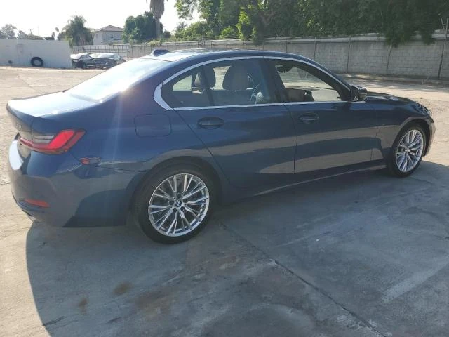 Photo 2 VIN: 3MW69FF03R8E14125 - BMW 330I 