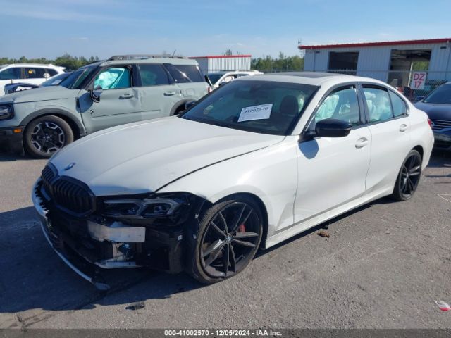 Photo 1 VIN: 3MW69FF04P8C81503 - BMW 330I 