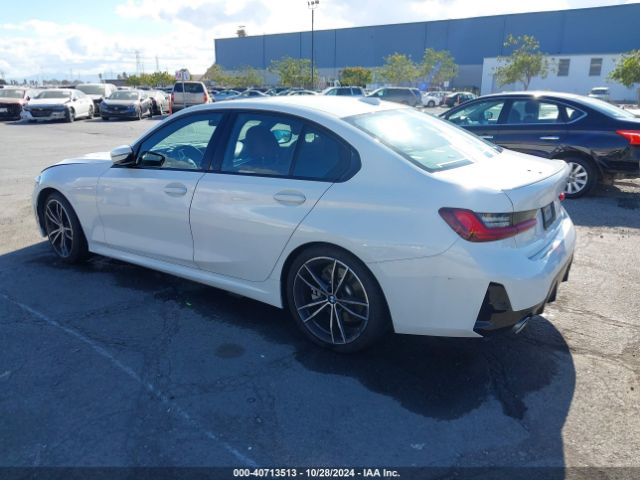 Photo 2 VIN: 3MW69FF06P8C80417 - BMW 330I 