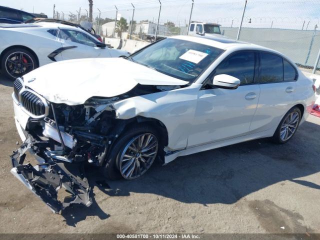 Photo 1 VIN: 3MW69FF06P8D23380 - BMW 330I 