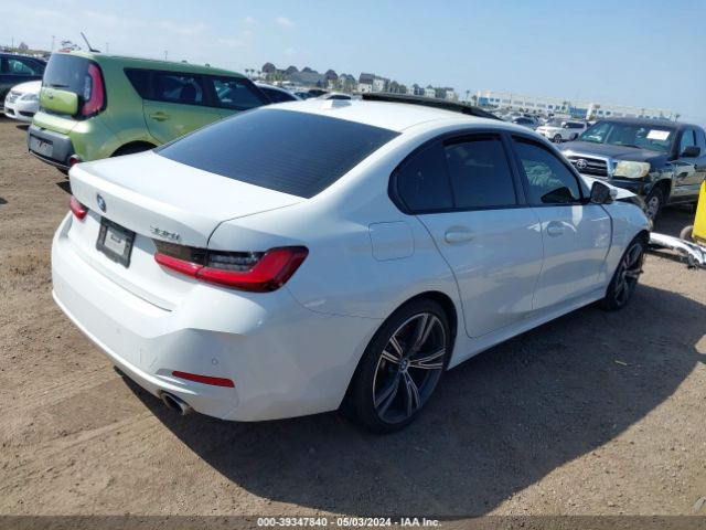 Photo 3 VIN: 3MW69FF07P8D08452 - BMW 330I 