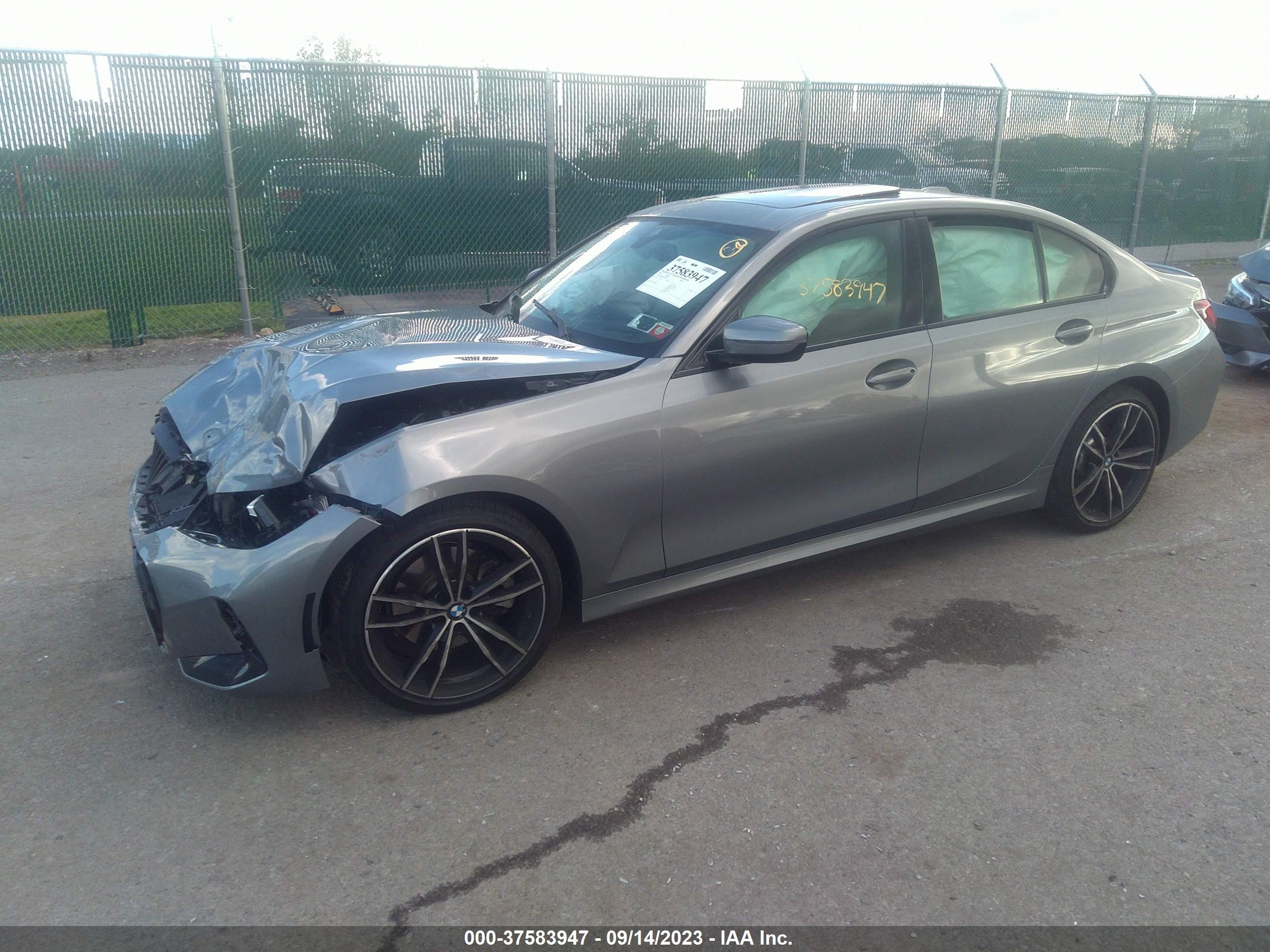 Photo 1 VIN: 3MW89FF05P8C80563 - BMW 330I 