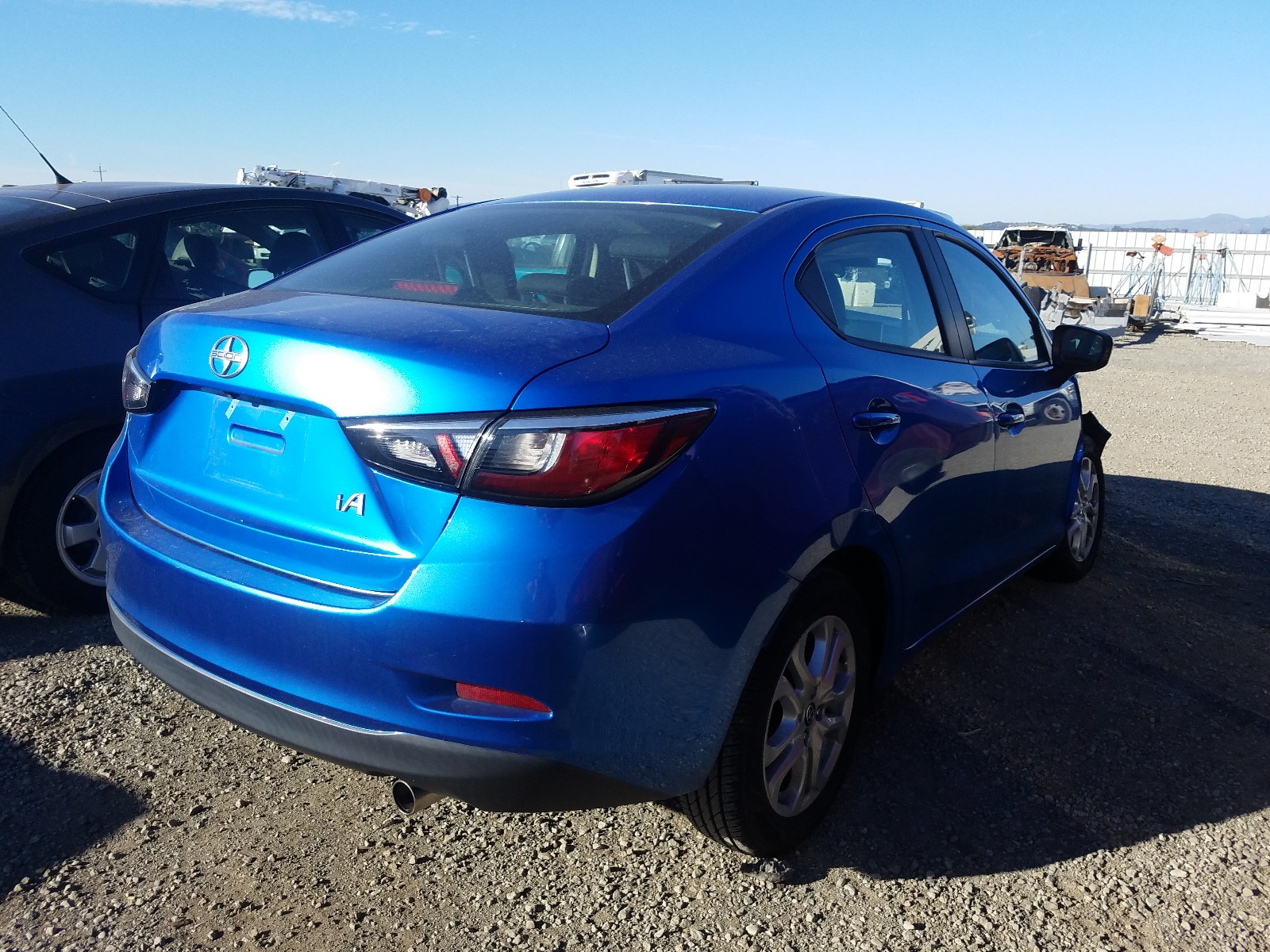 Photo 3 VIN: 3MYDLBZV8GY132279 - TOYOTA SCION IA 