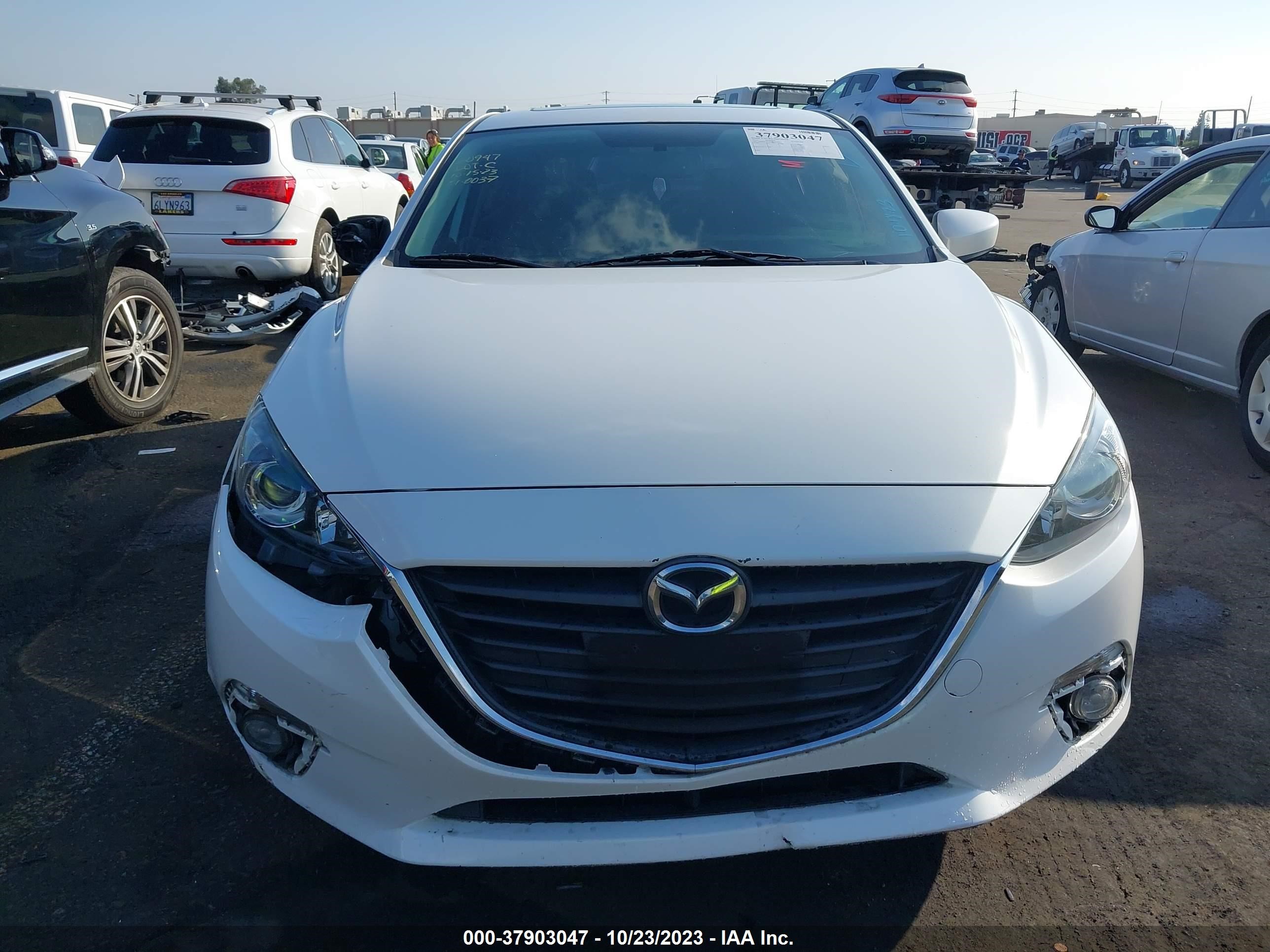 Photo 10 VIN: 3MZBM1M7XFM210702 - MAZDA 3 