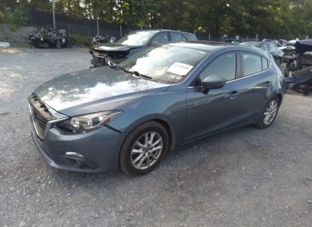 Photo 1 VIN: 3MZBM1M7XGM266091 - MAZDA MAZDA3 