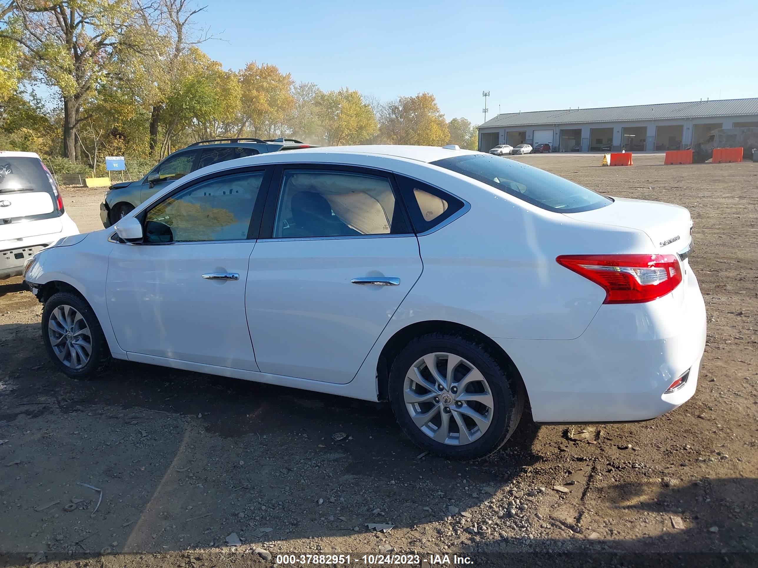 Photo 12 VIN: 3N1AB7AP7KY329745 - NISSAN SENTRA 