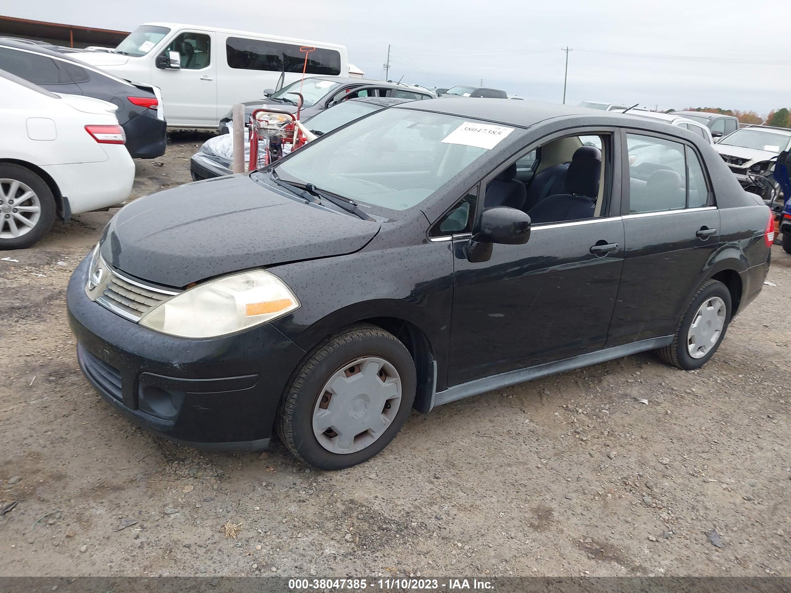 Photo 1 VIN: 3N1BC11E27L398697 - NISSAN VERSA 