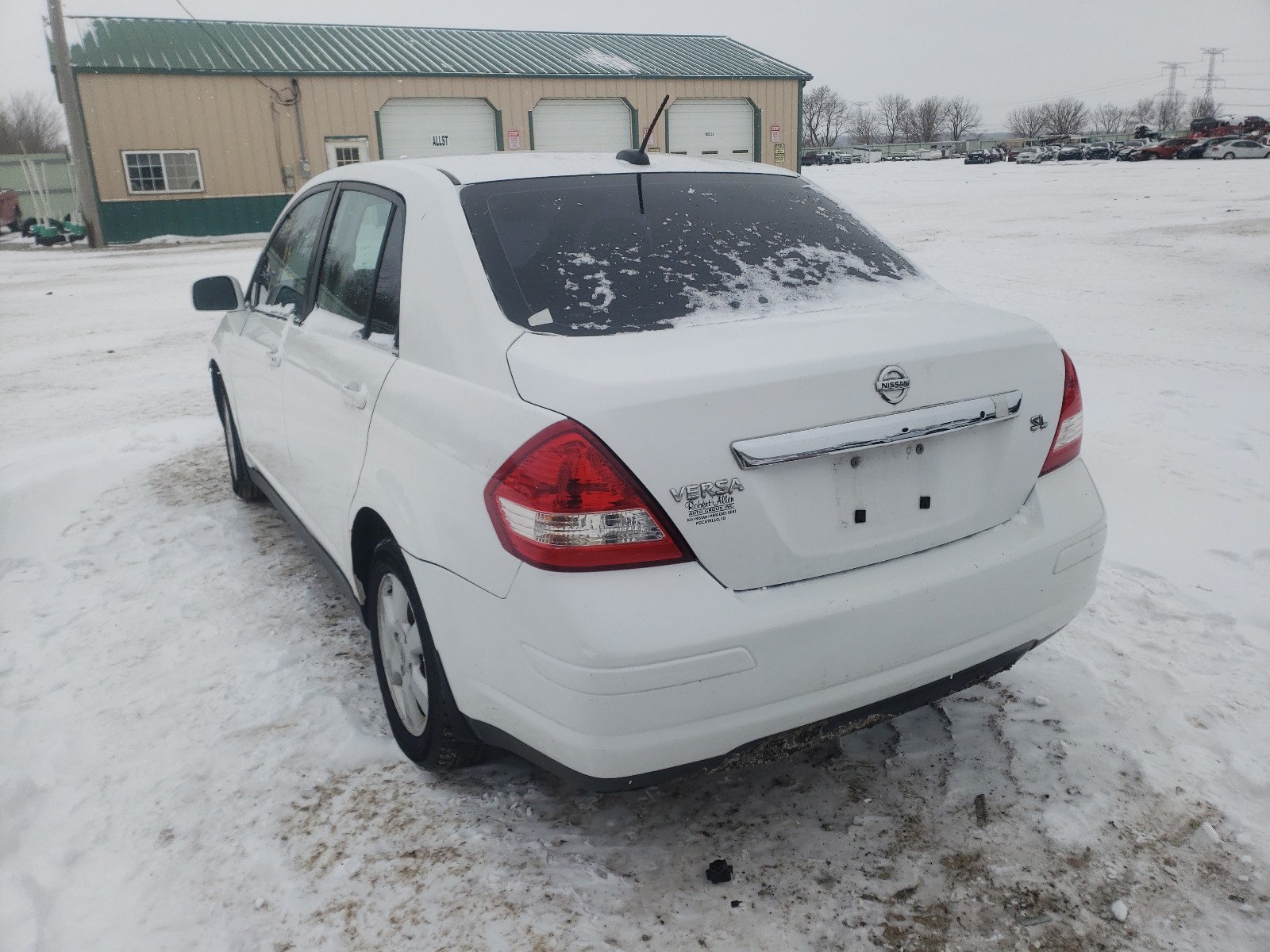 Photo 2 VIN: 3N1BC11E37L420657 - NISSAN VERSA S 