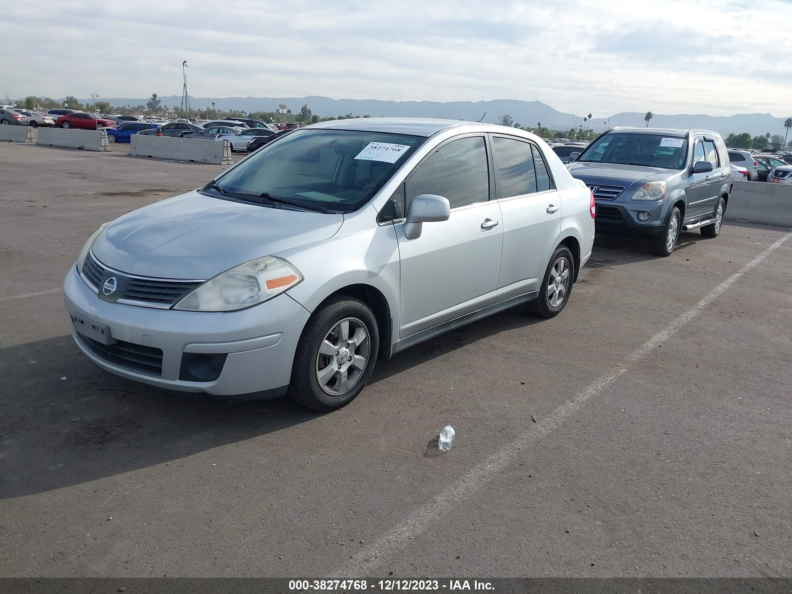 Photo 1 VIN: 3N1BC11E57L406792 - NISSAN VERSA 