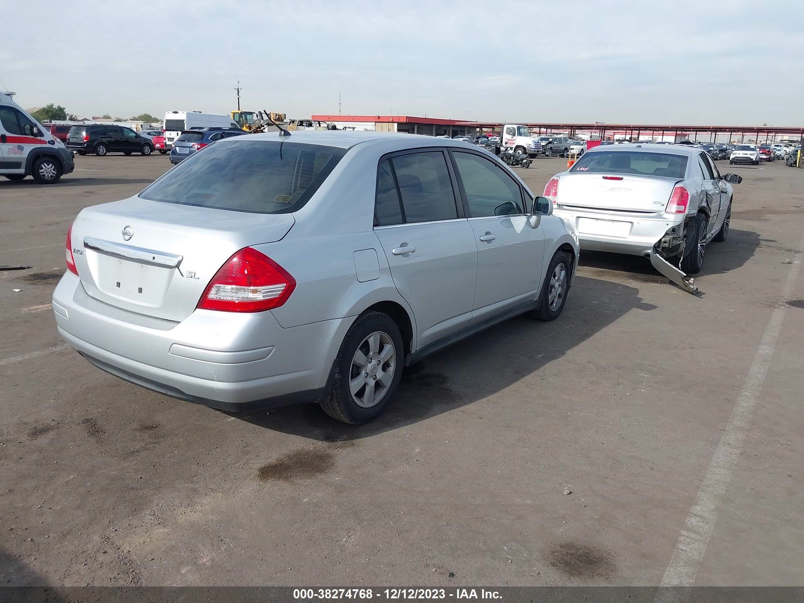 Photo 3 VIN: 3N1BC11E57L406792 - NISSAN VERSA 