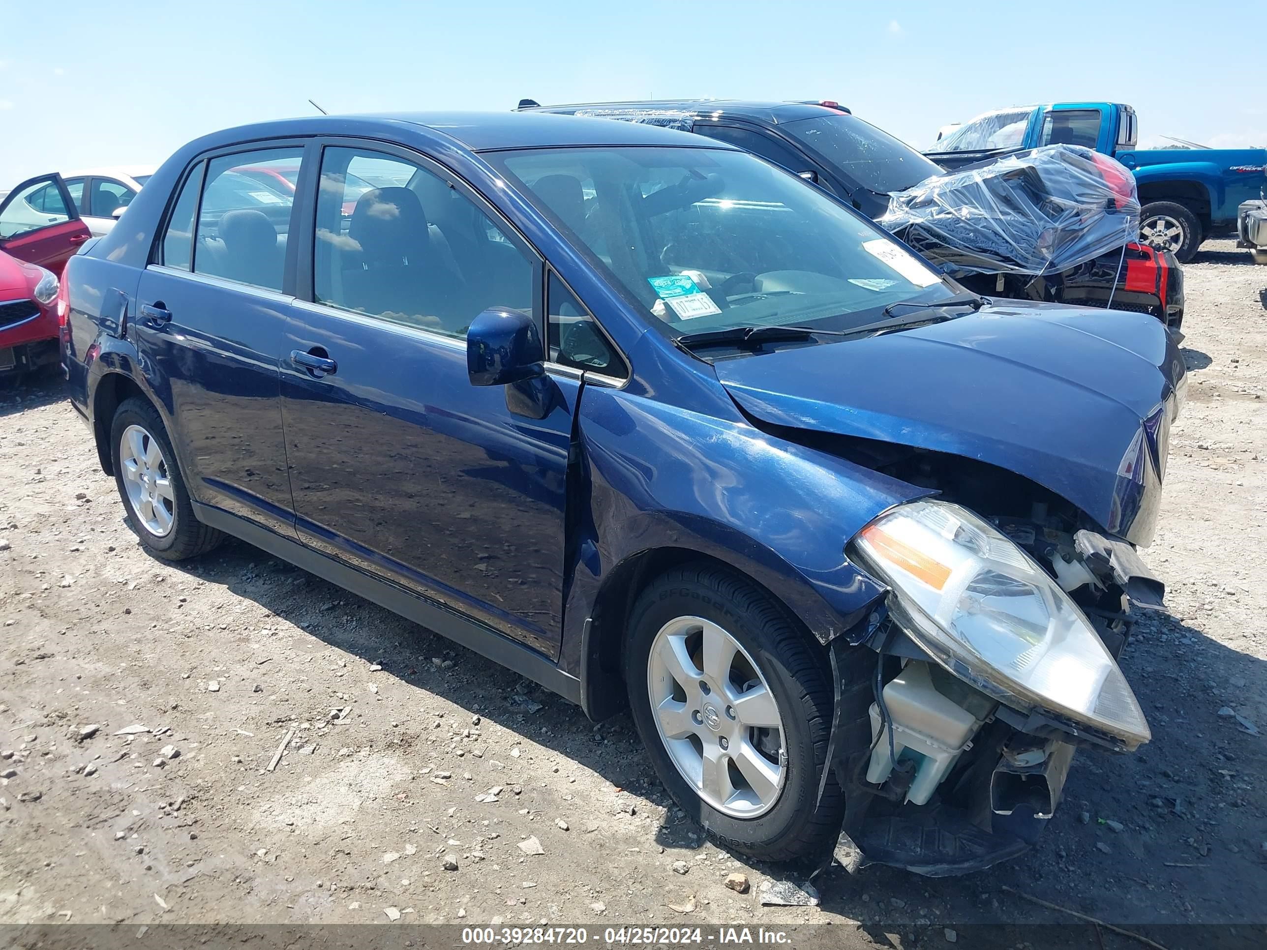 Photo 0 VIN: 3N1BC11E77L396606 - NISSAN VERSA 