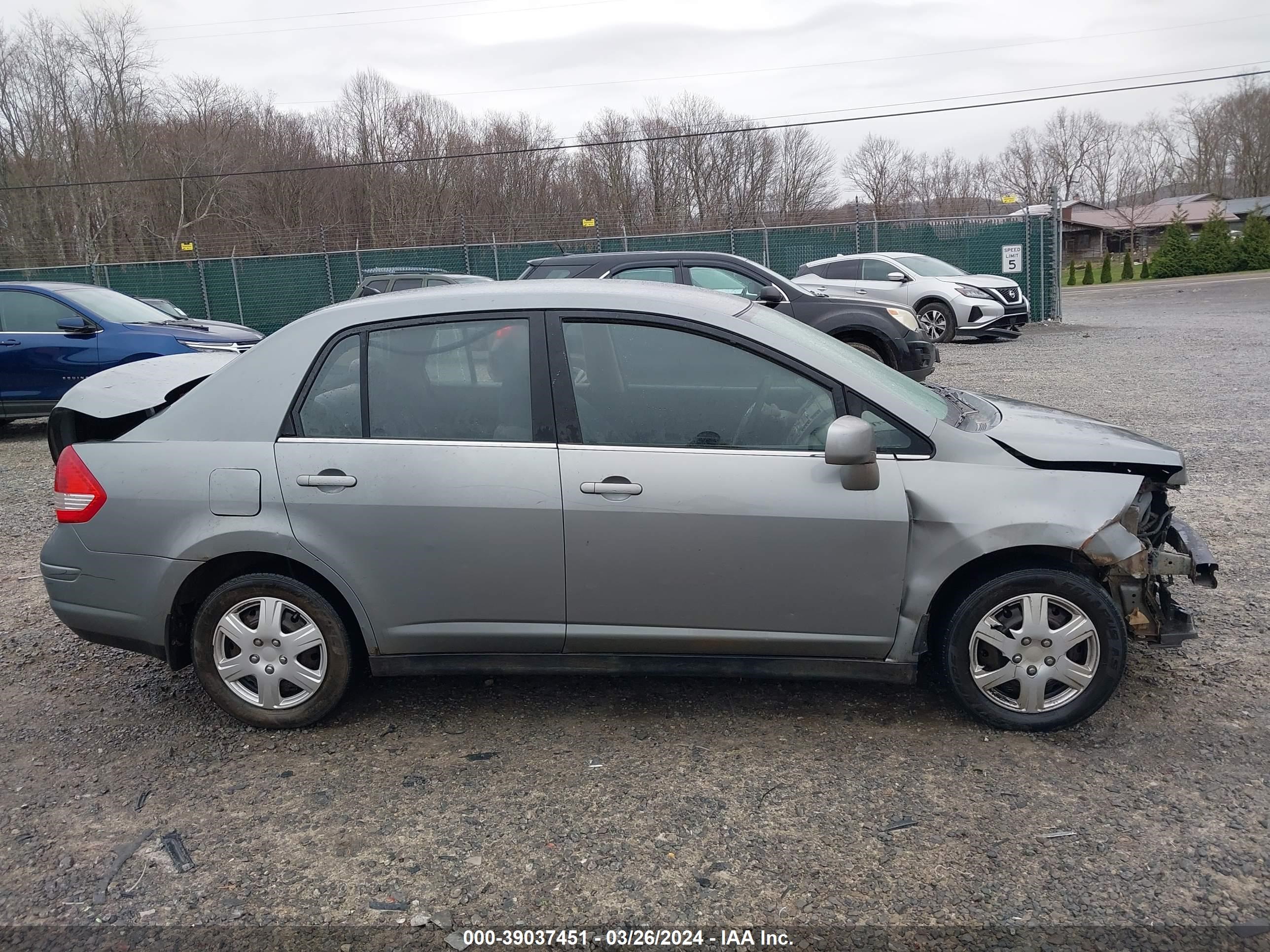 Photo 13 VIN: 3N1BC11E97L410909 - NISSAN VERSA 