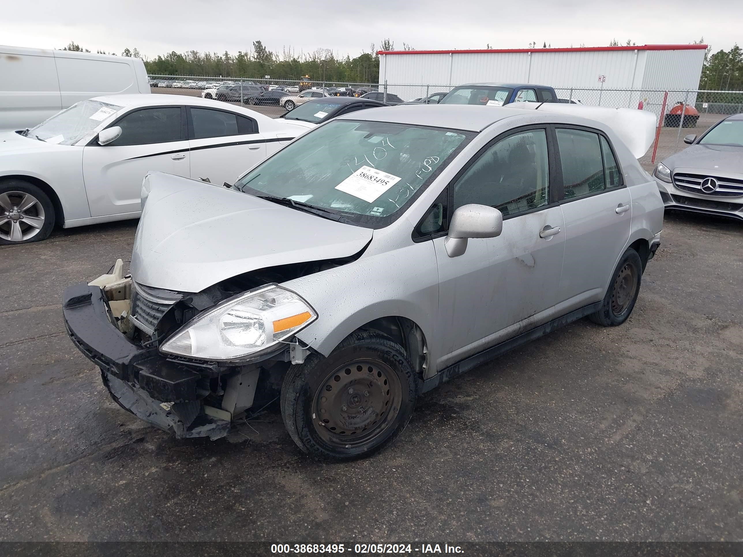 Photo 1 VIN: 3N1BC11E99L441404 - NISSAN VERSA 