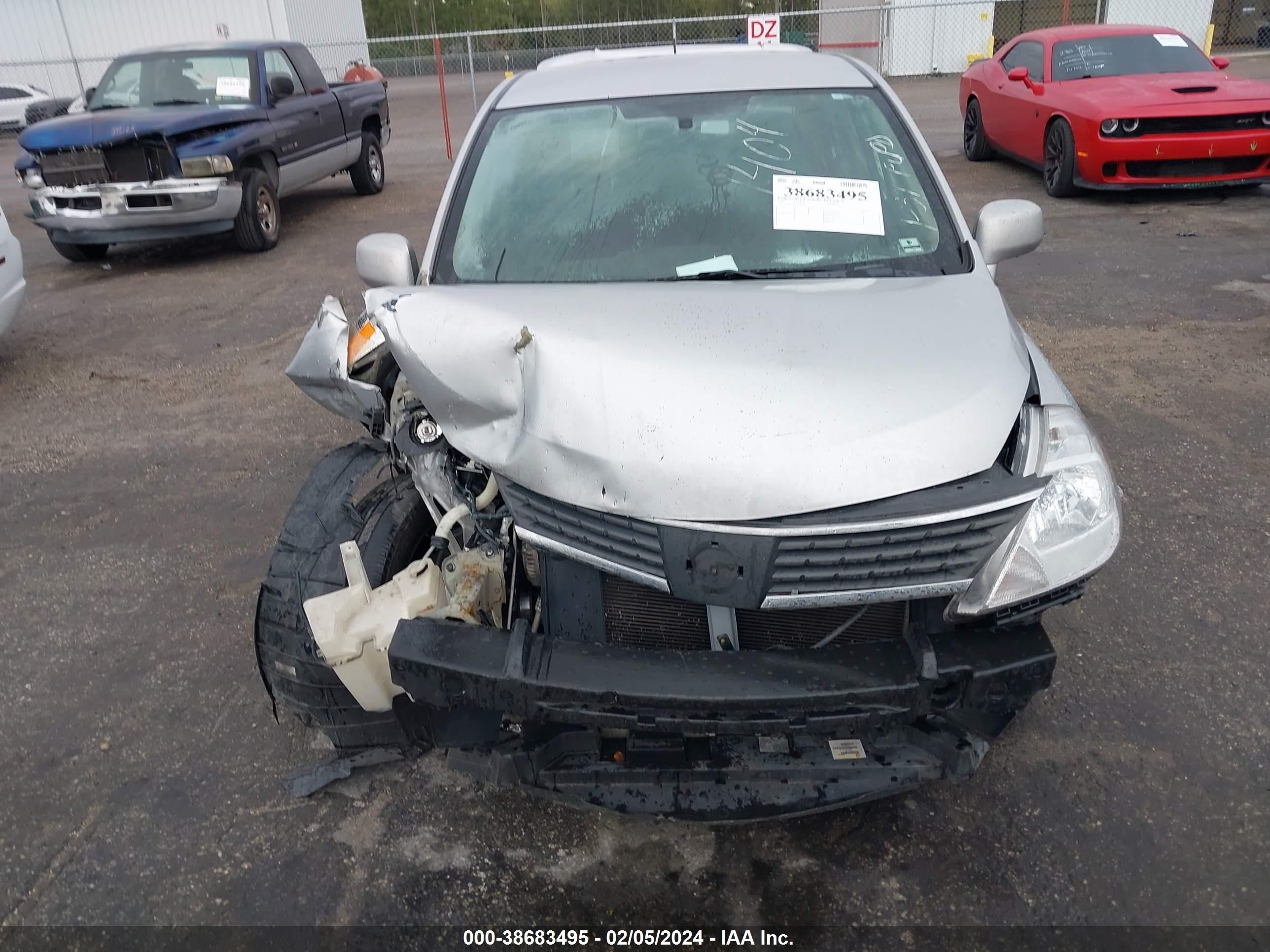 Photo 11 VIN: 3N1BC11E99L441404 - NISSAN VERSA 