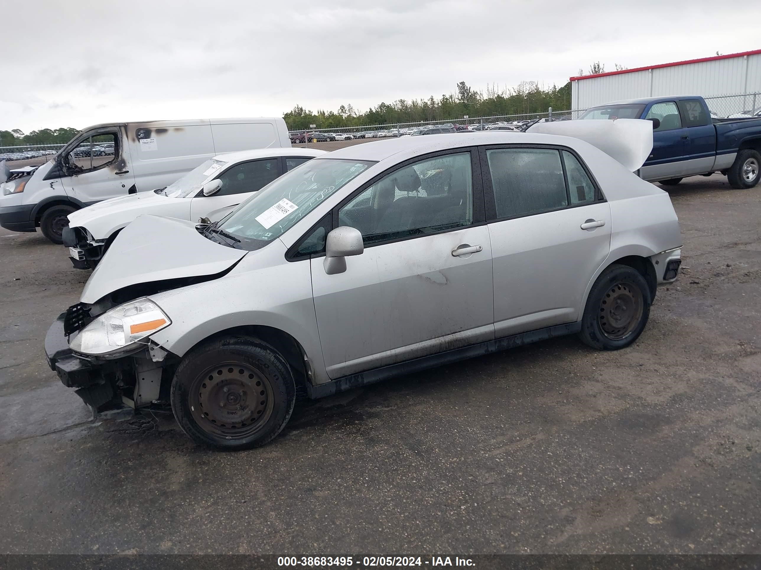 Photo 13 VIN: 3N1BC11E99L441404 - NISSAN VERSA 