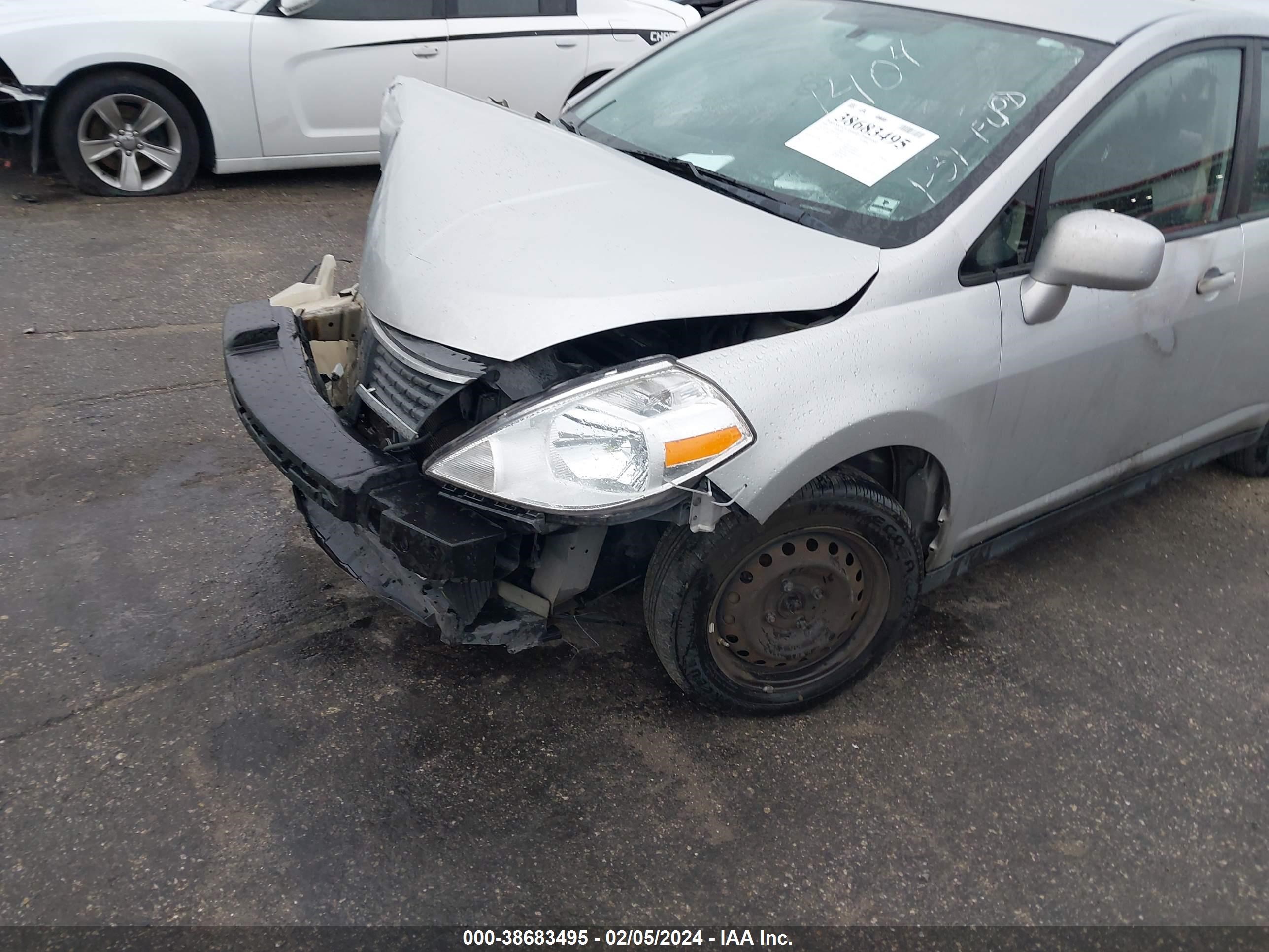 Photo 5 VIN: 3N1BC11E99L441404 - NISSAN VERSA 