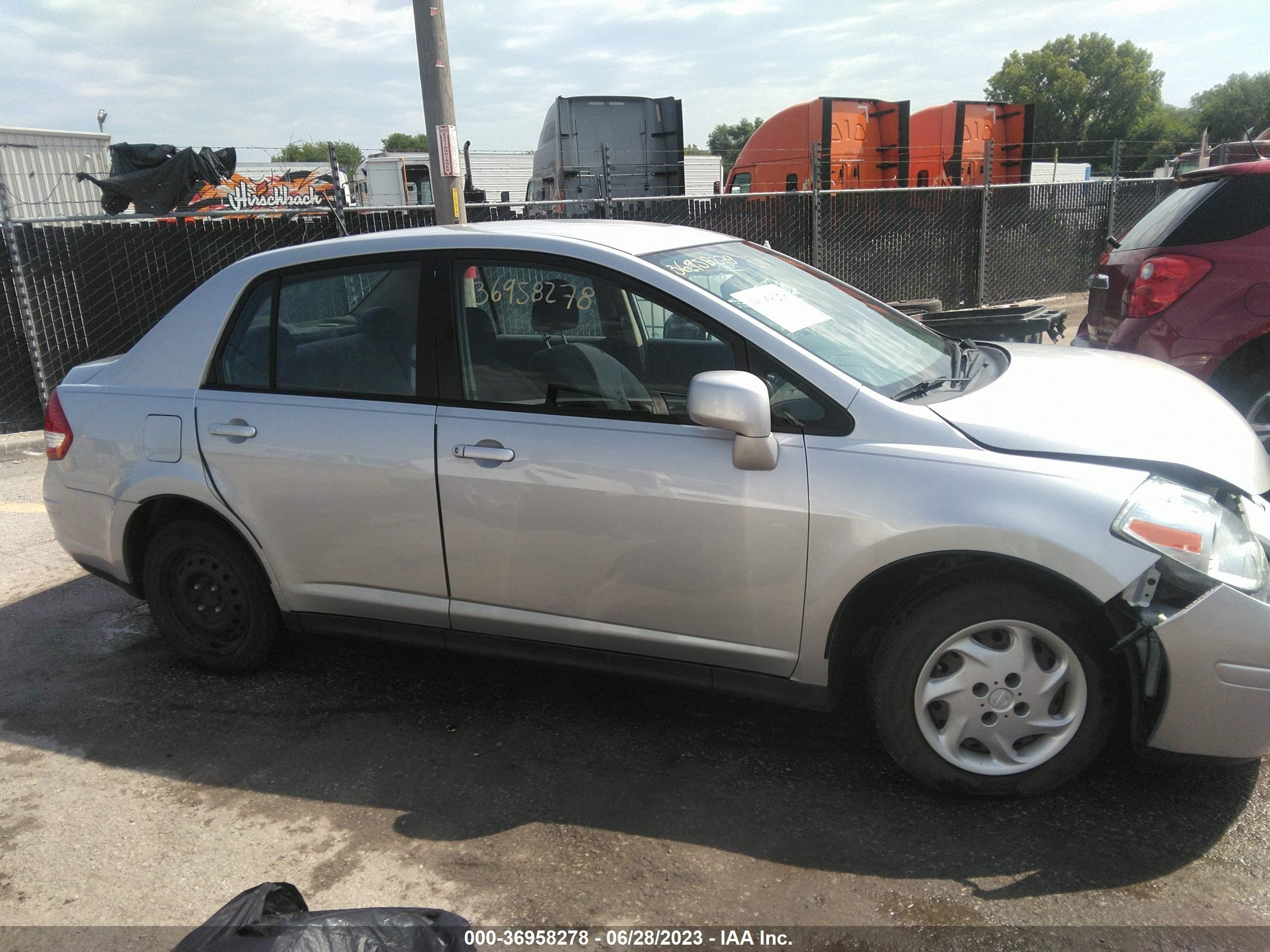 Photo 12 VIN: 3N1BC11EX9L387479 - NISSAN VERSA 