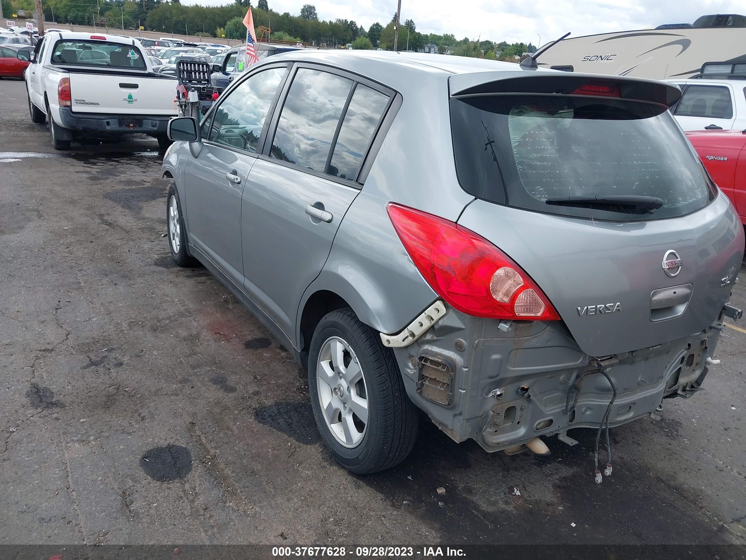 Photo 2 VIN: 3N1BC13E19L411455 - NISSAN VERSA 