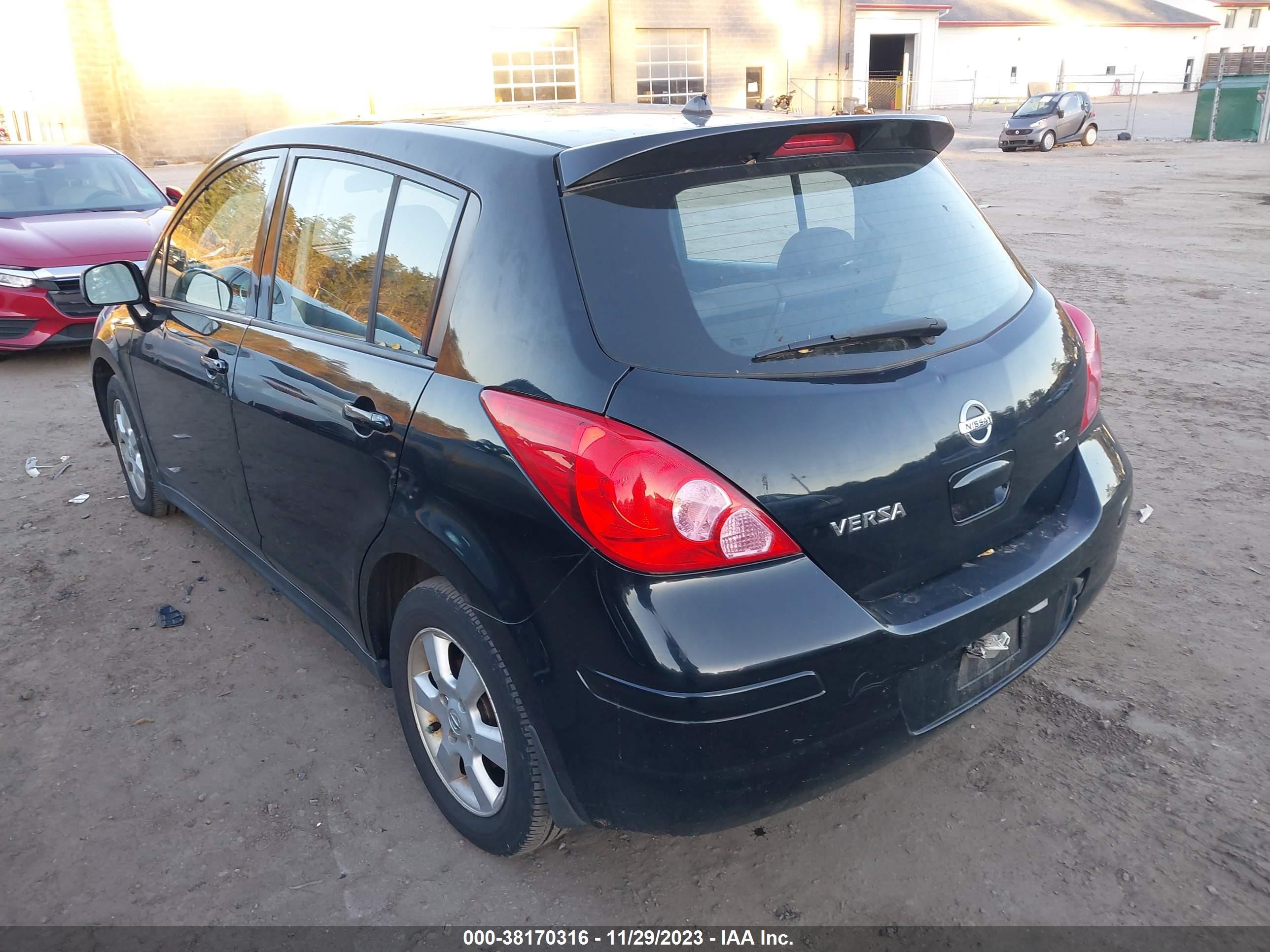 Photo 2 VIN: 3N1BC13E69L351639 - NISSAN VERSA 